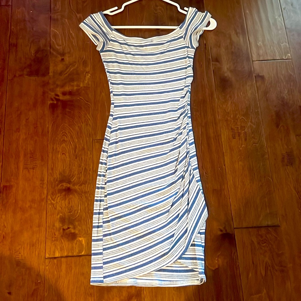 Soprano small, body hugging dress.